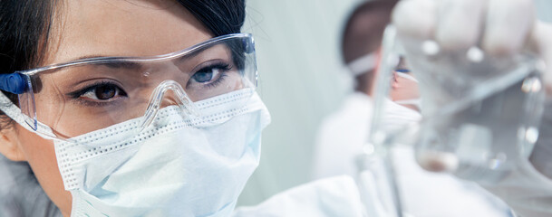 Asian Female Woman Scientist Medical Research Lab or Laboratory Panoramic Header - 607791715