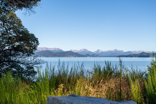 Dive into the tranquility of Nahuel Huapi, where the immensity of the lake invites contemplation and rejuvenation