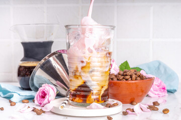 Iced Rose flower latte coffee drink, with pink rose petals taste almond milk, espresso, crushed ice