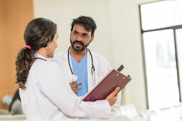 doctor in hospital Consulting the patient's test results