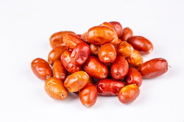 Fresh raw silverberry fruits in bowl with bunch of silverberry tree, oleaster or russian olive ( Elaeagnus )