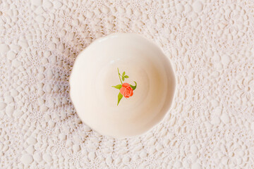 Closeup of porcelain bowl from above