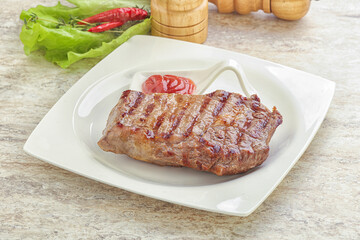 Grilled rib-eye steak beef meat