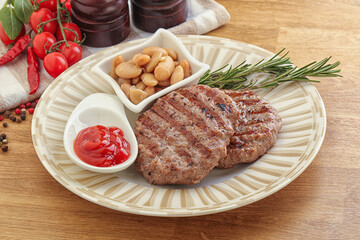 Grilled beef burger cutlet with sauce