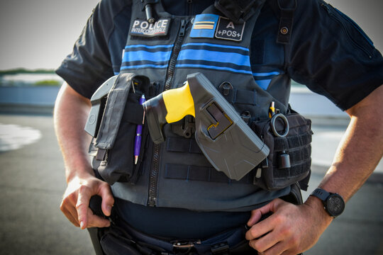 view on an electric taser of a french policeman