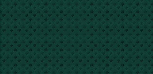 Green surface with card playing suits background