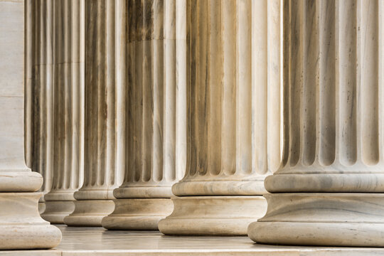 Architectural detail of marble ionic order columns	