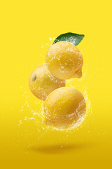 Creative layout made from lemon fruit and leaves isolated on yellow background, in water splashing.