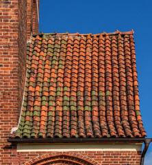 General view and close-up of architectural details of the St. Anthony of Padua Catholic Church built in 1911 in Sarnowo, Masuria, Poland.