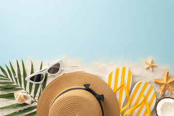Summer beach holiday idea. Top view of vacation essentials: sunhat, flip-flops, shell, starfish,...