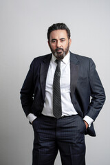 Indian corporate or businessman giving expression on white background.