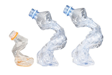 
Crumpled waste plastic bottles isolated on white background. Recyclable trash
