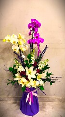 Purple and yellow flower arrangement