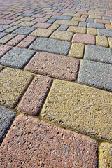Colored concrete self locking flooring blocks assembled on a substrate of sand - type of flooring...