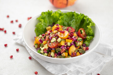 Portion of gourmet healthy fresh salad with tomatoes