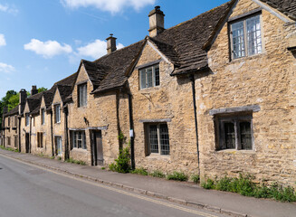 Castle Combe Wiltshire beautiful street with houses Cotswolds Area of Natural Beauty near Chippenham England UK