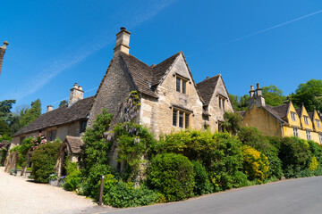 Castle Combe Wiltshire architecture within the Cotswolds Area of Natural Beauty near Chippenham England UK - obrazy, fototapety, plakaty