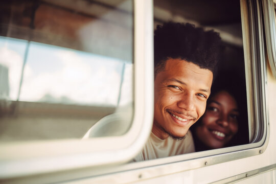 Generative AI illustration of happy diverse couple smiling and looking at camera while sitting in van during road trip together