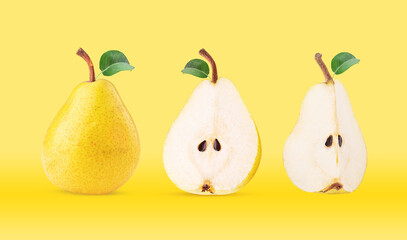 Fresh yellow pears whole and cut in half, quarter, with green leaf