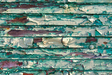 Color Peel wood texture.old weathered wooden planks wall as background, grunge texture pattern with scratches and paint peel off details.old plank rotted with paint peeling off.cracked paint texture.