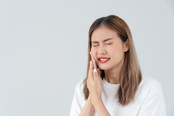 Fototapeta na wymiar Asian woman feel toothache from gingivitis, female suffer tooth, decay problems, dental care. sensitive tooth, decay problem, bad breath, Gingival Recession, Oral Hygiene instruction, tooth extraction