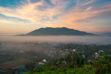 Obraz premium Mountains during dawn. Beautiful natural landscape in the summer time with fog