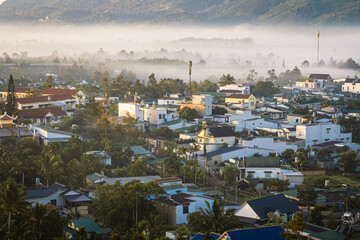 Naklejka premium Mountains during dawn. Beautiful natural landscape in the summer time with fog