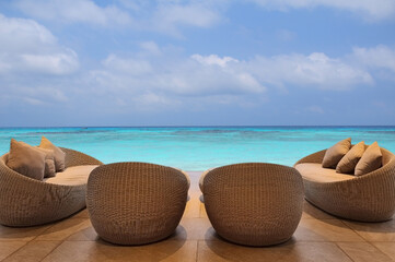 Set of Luxury Sofa Bed and Soft Pillow for Relaxing with Sea View and Blue Sky.