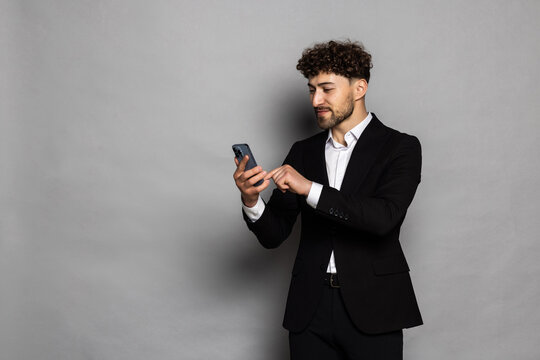 Man making selfie on smartphone camera, blogger communicating, recording video for followers, waving hand, saying hello.