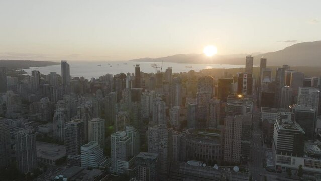 Panning right along the high rises of Vancouver at sunset