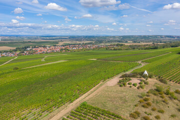 Bird's-eye view of the trullo on the Adelberg near Flonheim/Germany in Rhineland-Palatinate surrounded by vineyards