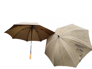 Two umbrellas against each other isolated
