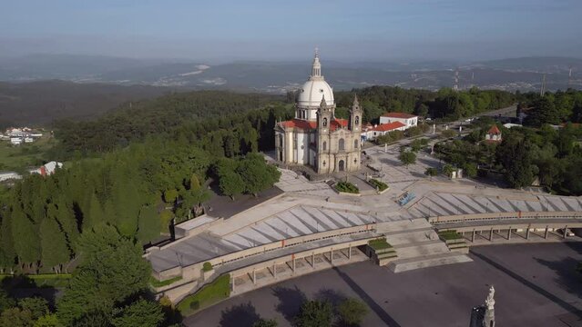 Aerial orbiting shot of the historic Shrine of Our Lady of Sameiro, one of the most visited sites of Marian worship, located on top of Mount Sameiro in Braga, northern Portugal.	
