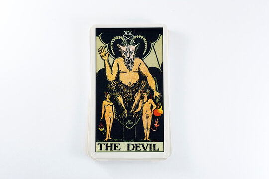 Madrid, Spain - May 22, 2023: Tarot cards, Rider Waite tarot cards, the devil vintage card in the foreground.