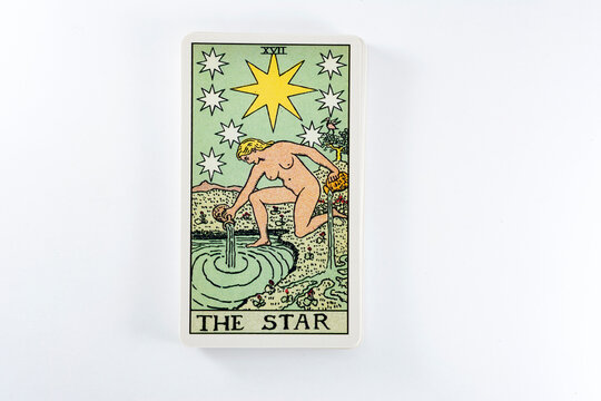 Madrid, Spain - May 22, 2023: Tarot cards, Rider Waite tarot cards, the star vintage card in the foreground.