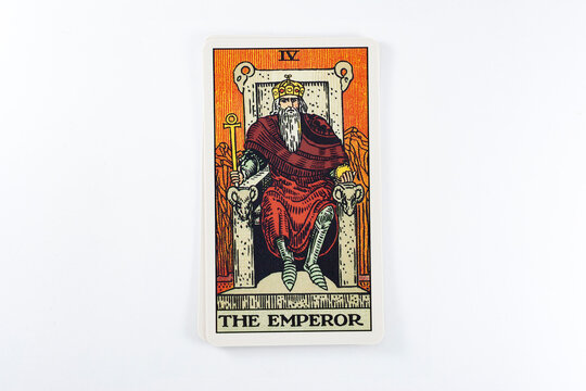 Madrid, Spain - May 22, 2023: Tarot cards, Rider Waite tarot cards, the emperor vintage card in the foreground.
