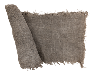 Burlap texture. A piece of torn burlap on a white background. Canvas. Packing material
