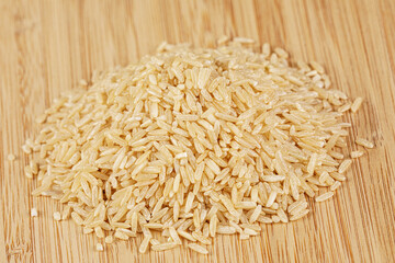 Close up of a pile of delicious uncooked Brown Rice