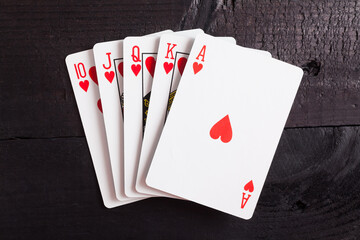 Royal flush. Playing cards isolated on a black background