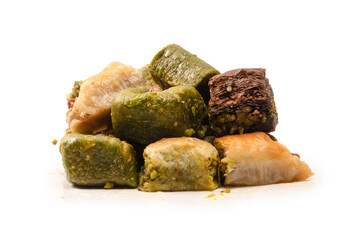 Turkish pistachio baklava isolated on a white background. A variety of turkish sweet baklava.