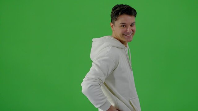 Young good-looking man in a green screen studio - people photography
