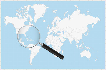 Magnifying glass showing a map of The Bahamas on a world map.