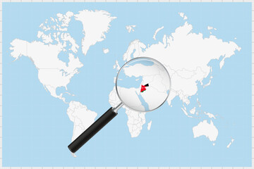 Magnifying glass showing a map of Jordan on a world map.