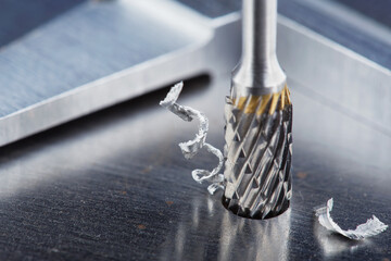 Milling cutter make sink in hole in steel billet. Locksmith work.