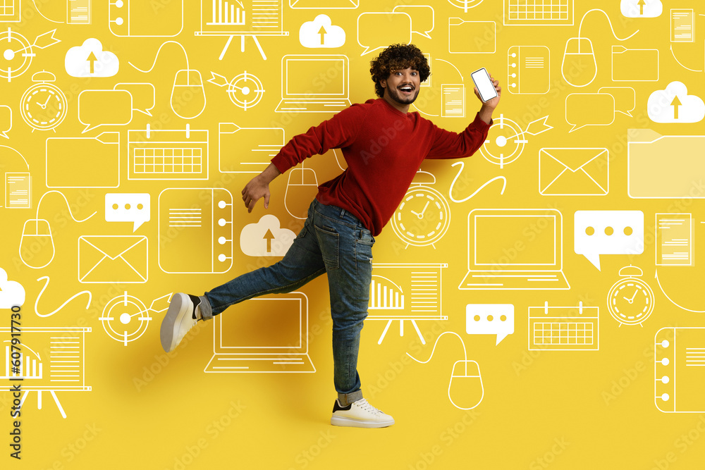 Poster smiling man with phone running over diverse digital world icons
