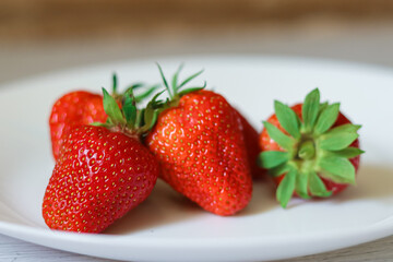 fresh big strawberries.diet.red berries.healthy food.vegetarianism.organic berry.strawberry cultivation.strawberries in a plate.healthy breakfast.berry diet.smoothie.dessert.
berries on a plate.red.