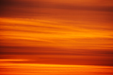 Red cloudy sky on a sunset, natural  background texture