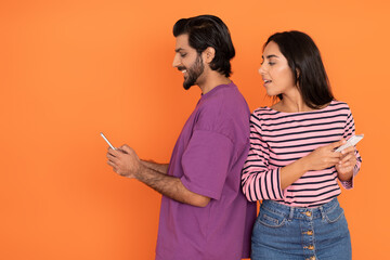 Suspicious woman turned back to man, reading message on phone