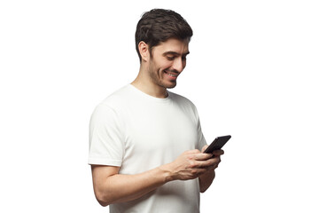 Side portrait of handsome man in t-shirt, looking at phone screen, surfing internet - 607941192