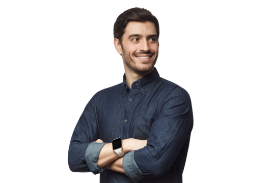 Ambitious young businessman looking away with arms crossed